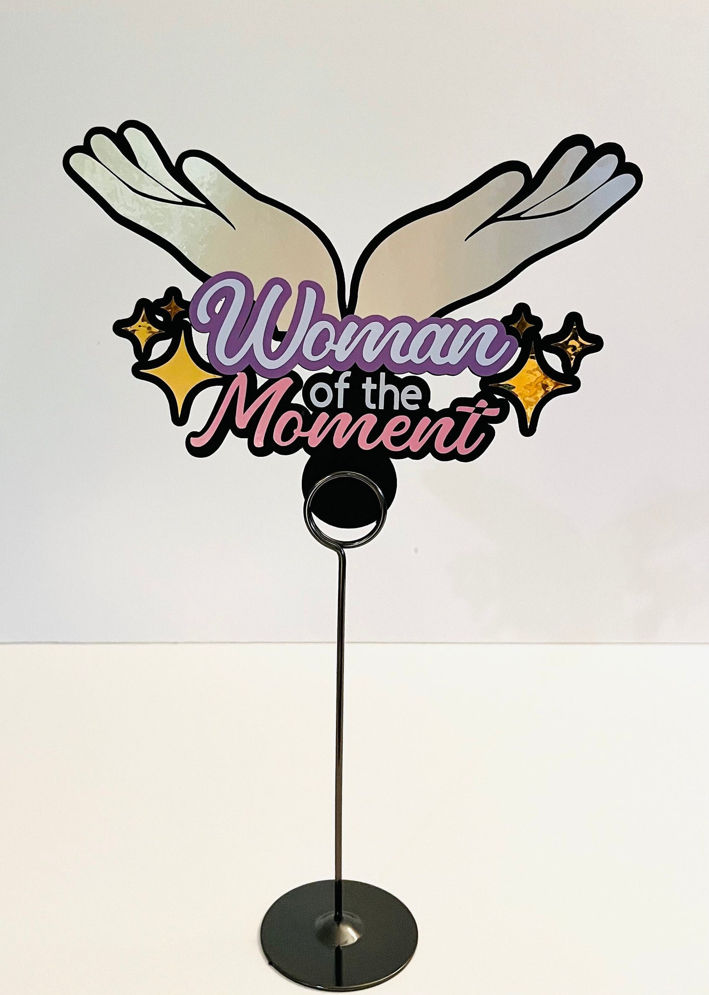 Woman of the moment Topper
