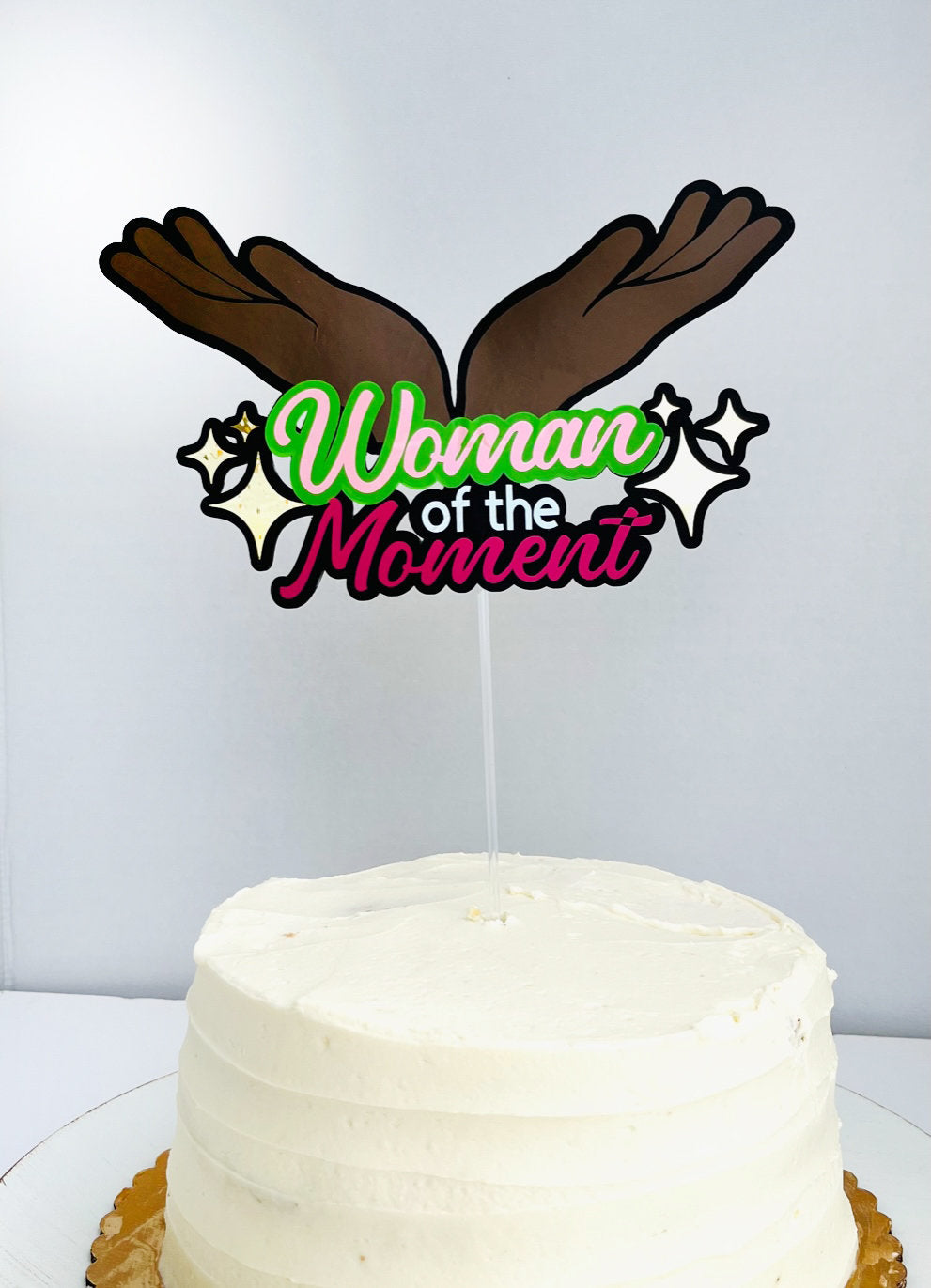 Woman of the moment Topper