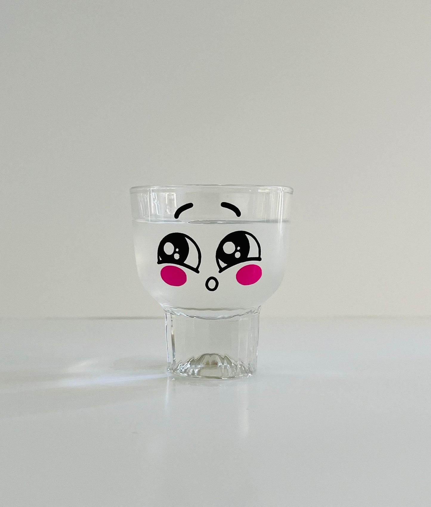 Color changed drunken drinking glasses. Face drinking glass